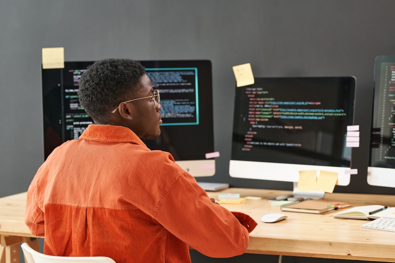 IT professional conducting data backup and disaster recovery services on computer