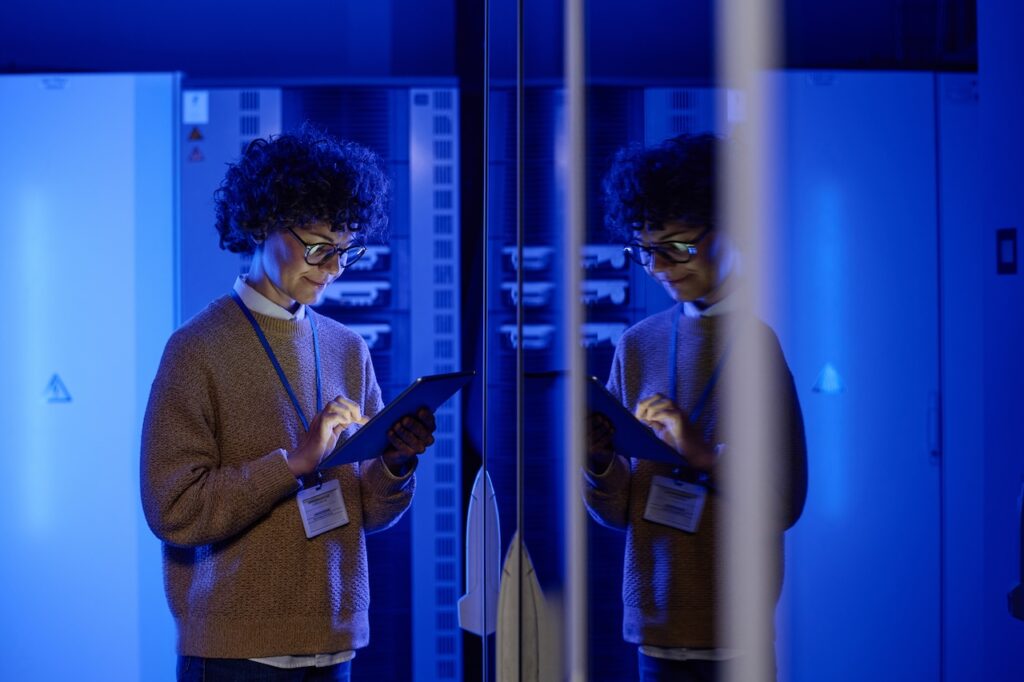 engineer working on offsite data storage in server room